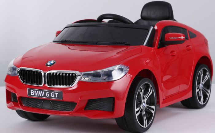 Electric Ride on Car BMW 6GT Single seat Red Original Licenced Battery Powered Opening Doors 2x Engine Battery 2x 6V 4 Ah 2.4 Ghz remote control Smooth start Soft EVA wheels Smooth start